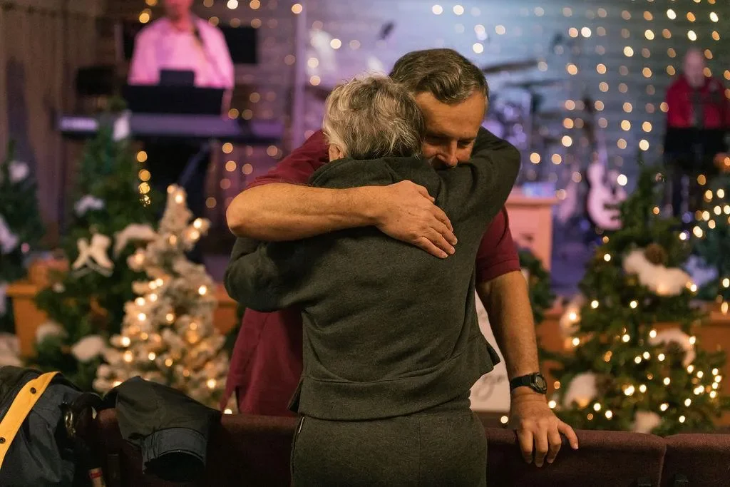 People Genuinely Hugging At Life Community Church Of The Nazarene Church In Colorado Springs, CO